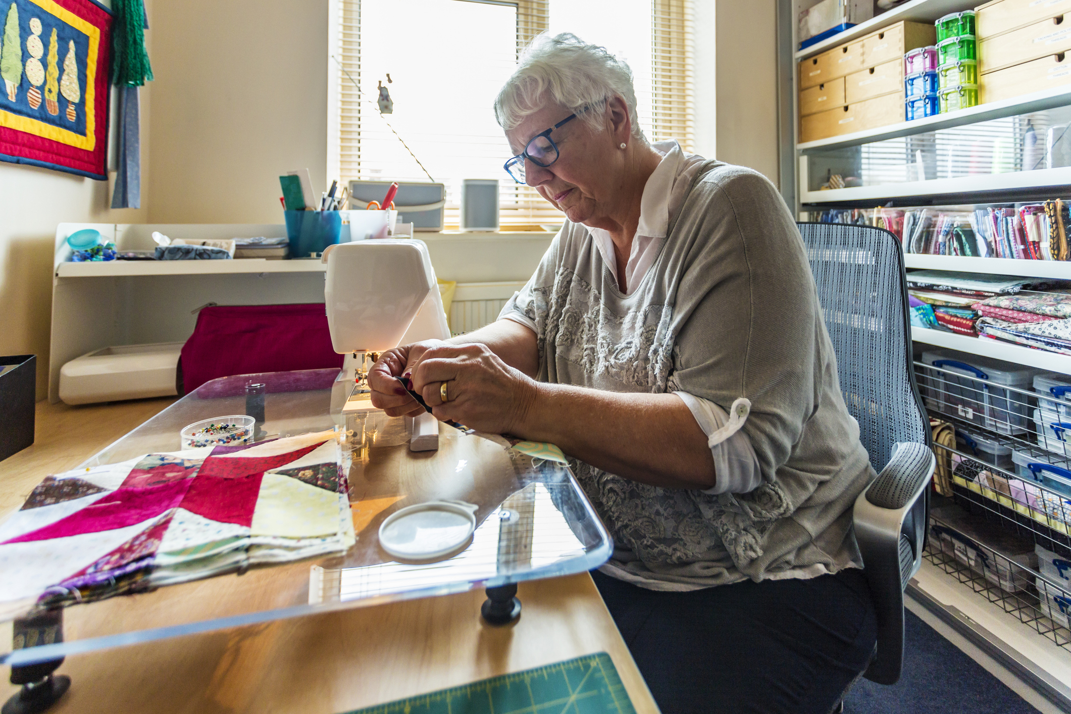Elder lady quilting