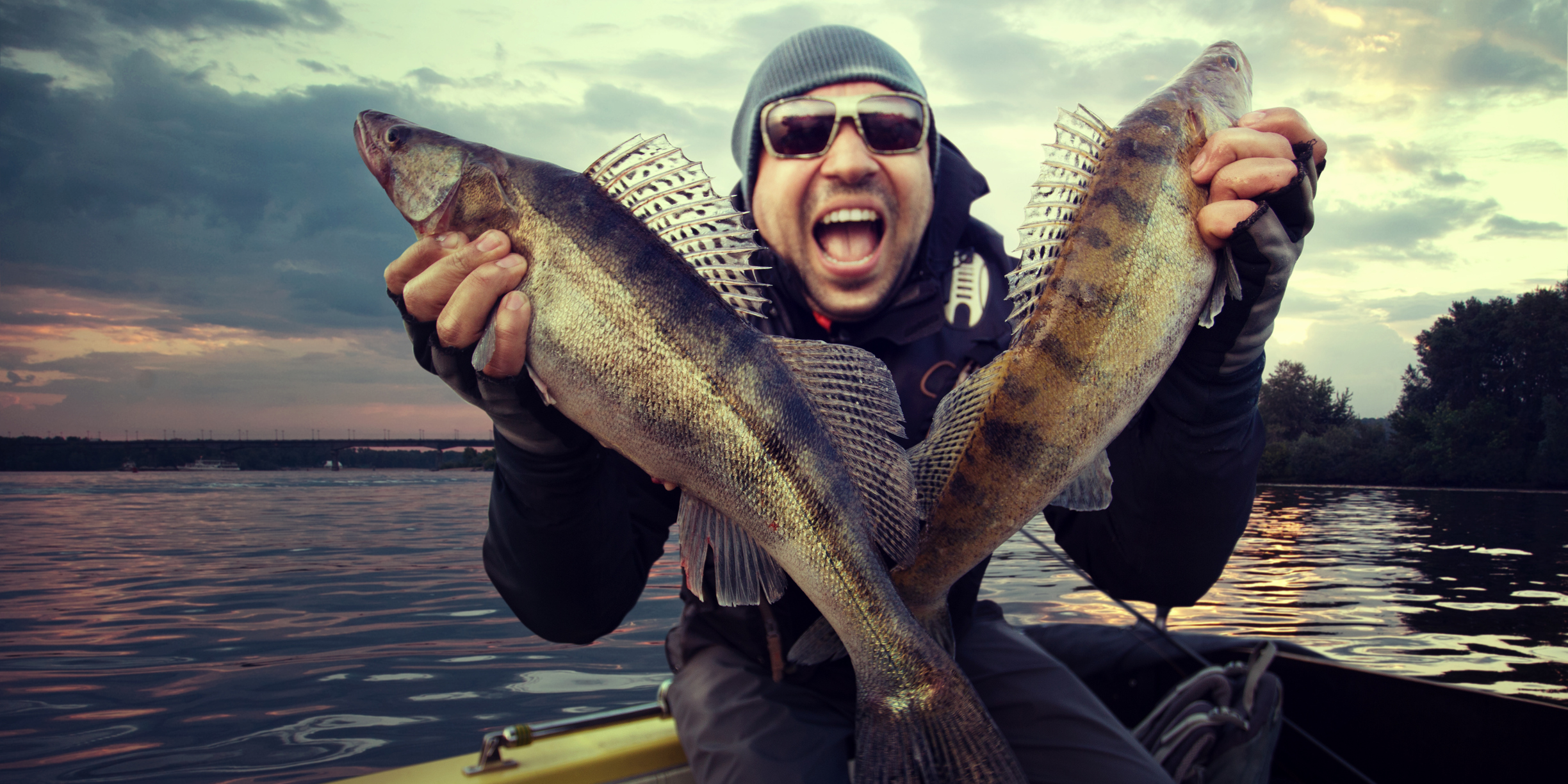 Man holding two fish