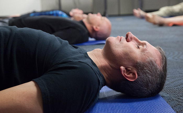 Mindfulness, a method to prevent and manage stress, is built into the yoga classes. It’s also offered as a separate 10-minute session at the end of patrol shifts.